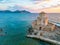 Sunset view of Bourtzi of Methoni Castle in Greece