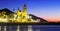 Sunset view of church at sea beach. Sitges