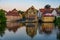 Sunset view of cityscape of German city Bamberg reflecting on ri