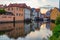 Sunset view of cityscape of German city Bamberg reflecting on ri