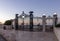 Sunset view of decorative gate at the entrance to the upper terrace of the Bahai Garden in Haifa city in Israel