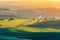 Sunset view of grain silos and wheat fields in the rolling Palouse hills