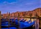 Sunset view of Grand Canal, Venice, Italy. UNESCO heritage city famous for its waterways and gondolas, beautiful sunset
