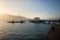 Sunset view of Ilhabela pier with Sao Sebastiao on background - Ilhabela, Sao Paulo, Brazil