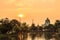 The sunset view of Landmark, the Ananta Samakhom Throne Hall with reflection on the water.