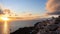 The sunset view of the landmark view in Oia, Santorini. Image of famous village Oia located at one of Cyclades island of Santorini