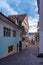 Sunset view of a narrow street winding through the historical ce