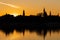 Sunset view of Oder river, embankment and church silhouettes. Wroclaw, Poland