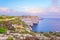 Sunset view over Ta Cenc cliffs on Gozo, Malta