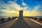 Sunset view of Piombino piazza bovio lighthouse and Elba Island