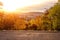 Sunset view of Prague from Vitkov hill with autumn park, scenic sunny cytiscape, Zizkov district, Czech Republic