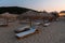 Sunset view of reed parasols at Shkorpilovtsi beach in Bulgaria.