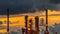 Sunset view of refinery, petrochemical and petroleum industry produce fuel and power energy for transportation business and