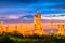 Sunset view of refinery petroleum and petrochemical plant industrial with distillation column and engineering equipment and pipe