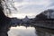 Sunset view on river Tiber with St. Peter Basilic in Rome