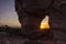 Sunset view through the rock. Arenite hole, in Jalapao, Brazil. Pedra furada.