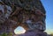 Sunset view through the rock. Arenite hole, in Jalapao, Brazil. Pedra furada.