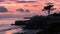 Sunset view of the rocky shoreline of the Pacific Ocean coastline, Santa Cruz, California