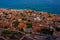 Sunset view of rooftops of Greek town Monemvasia