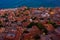 Sunset view of rooftops of Greek town Monemvasia