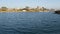 Sunset view of sea water from sailing boat or yacht, Oceanside harbor, summer vacations in California USA. City sign in