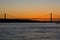 Sunset view of Tagus river Rio Tajo and 25th of April Bridge