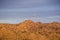 Sunset view of telecommunications tower on top of a hill close to the north border of Joshua Tree National Park, south California