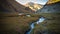 Sunset view to Tash-Rabat river and valley in Naryn province, Kyrgyzstan