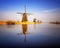 Sunset view at typical windmill at Kinderdijk, Holland.