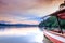 Sunset view of the Victoria Nile river, with trees growing and the reflections on the water, Jinja, Uganda