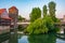 Sunset view of Weinstadel building, water tower, Henkerbrucke br