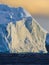 Sunset in the Weddell Sea with dramatic light on ice bergs