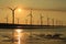 Sunset of wind farm at Gaomei Wetland refuge, taiwan