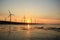 Sunset of wind farm at Gaomei Wetland refuge, taiwan