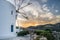 Sunset windmill view during hot summer day on Antiparos island in Cyclades in Greece