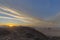 Sunset with windswept clouds in the Namib Desert