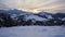 Sunset in winter snowy mountain scenery, slow movement of clouds ,timelapse