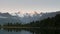 Sunset zoom in on mt Cook and Lake Matheson