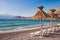 Sunshade and deck chair on beach at Baska in Krk Croatia