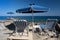 Sunshade and sun beds on Kalithea beach, Rhodes