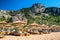 Sunshades and loungers at Tsambika beach in Rhodes island in Greece