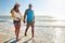 Sunshine on the mind and love in the soul. a happy young couple taking a walk on the beach.