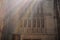 Sunshine rays in rainbow colors shining through stanined glass windows in historical catherdral in Frankfurt, Germany with beautif