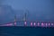 Sunshine Skyway Bridge in Tampa Bay Florida lit in pink lights to commemorate Breast Cancer Awareness Month