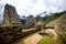 Sunshine view of Machupicchu stone anchient walls and temple among mountains