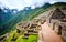 Sunshine view of Machupicchu stone anchient walls and temple among mountains