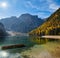 Sunshiny autumn peaceful alpine lake Braies or Pragser Wildsee. Fanes-Sennes-Prags national park, South Tyrol, Dolomites Alps,