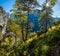 Sunshiny colorful autumn alpine scene. Peaceful rocky mountain view from hiking path near Almsee lake, Upper Austria