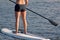 Suntanned Stand Up Paddle Boarder Woman