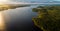 Suoyarvi lake at sunset surrounded by forests of Karelia